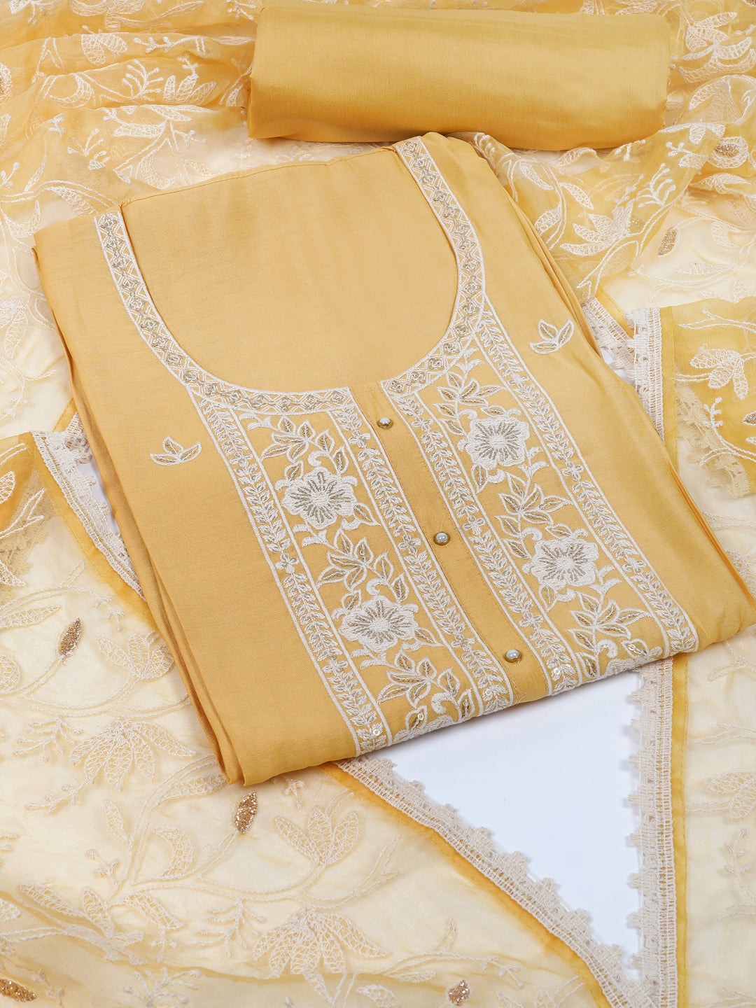 Party Edit- Unstitched suits set is elevated with delicate white thread embroidery and organza dupatta
