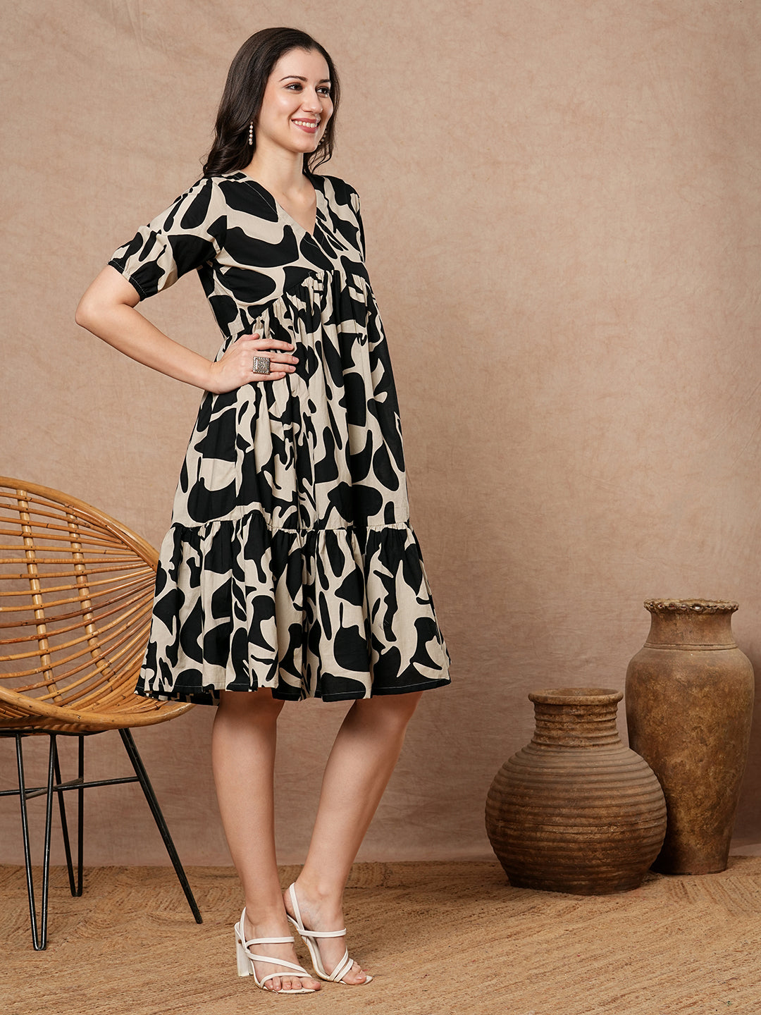 Printed cotton dress with gathering and pocket