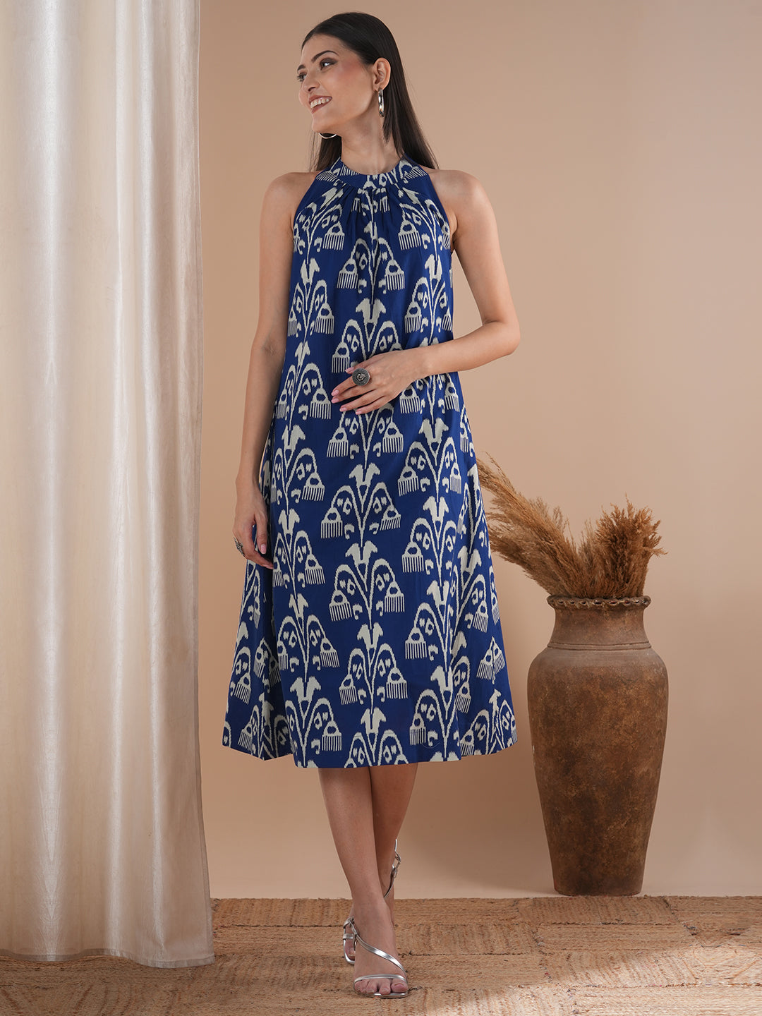 Gathered halter neck dress in a bold ikat print on cotton