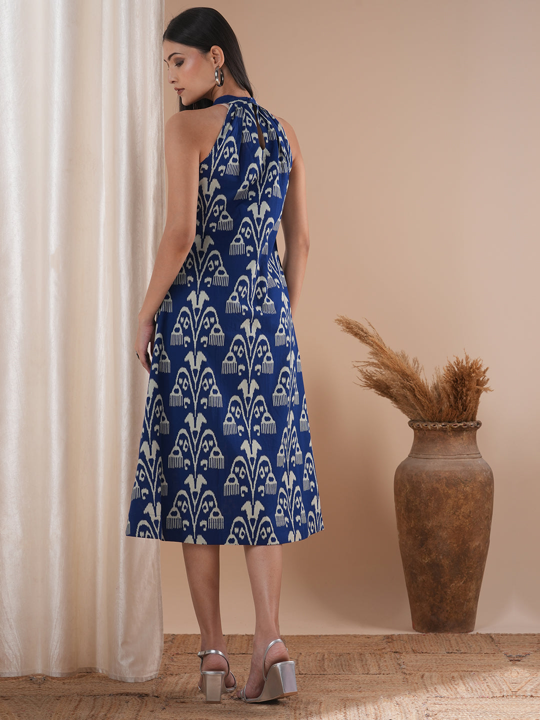 Gathered halter neck dress in a bold ikat print on cotton