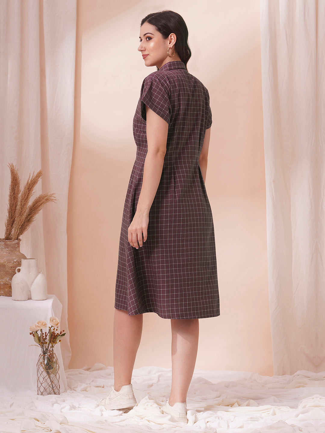 Checkered Fit and Flare dress with extended shoulder sleeve and pocket.