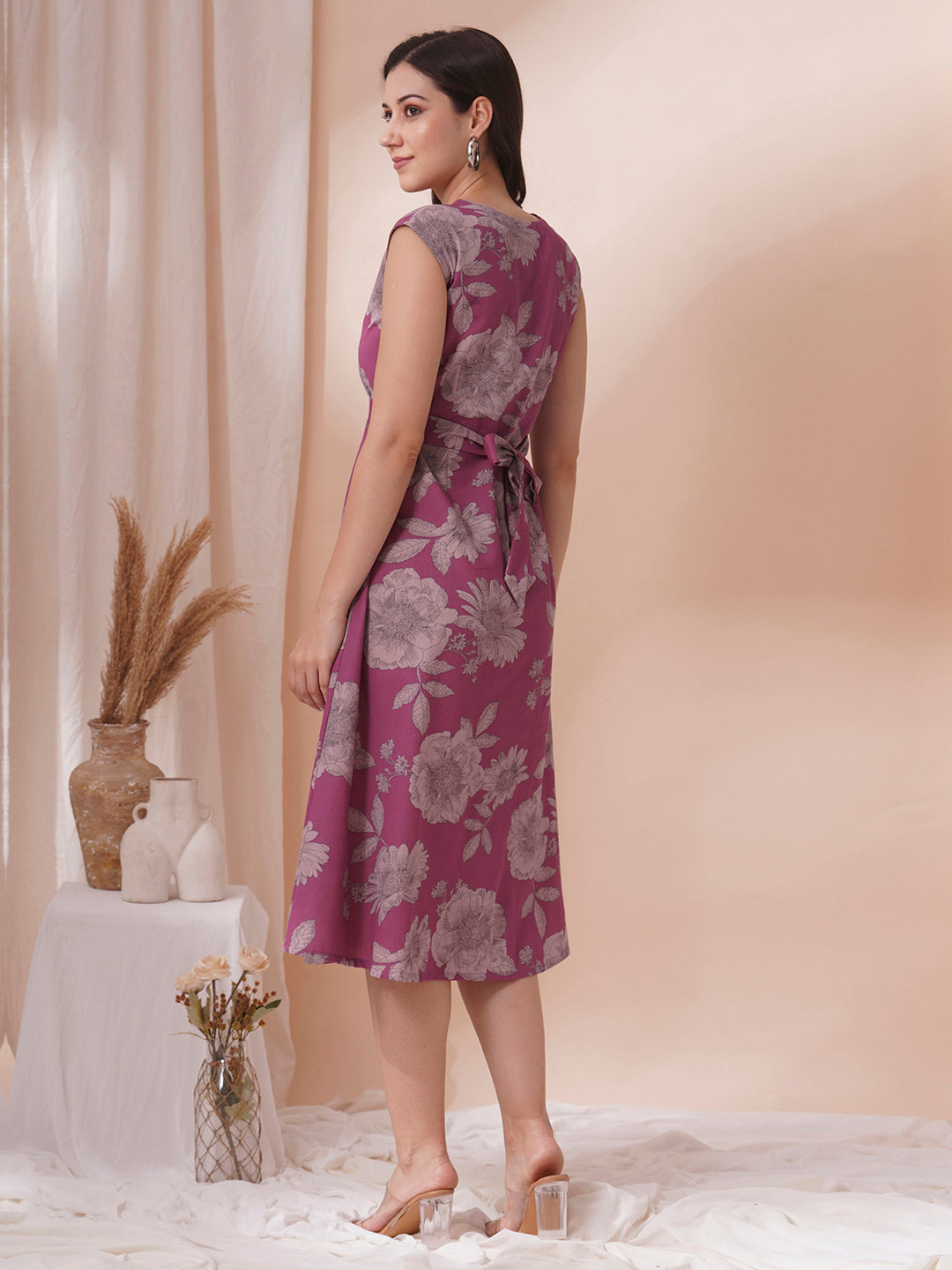 Printed flex extended shoulder dress with functional centre placket and waist tie-up.