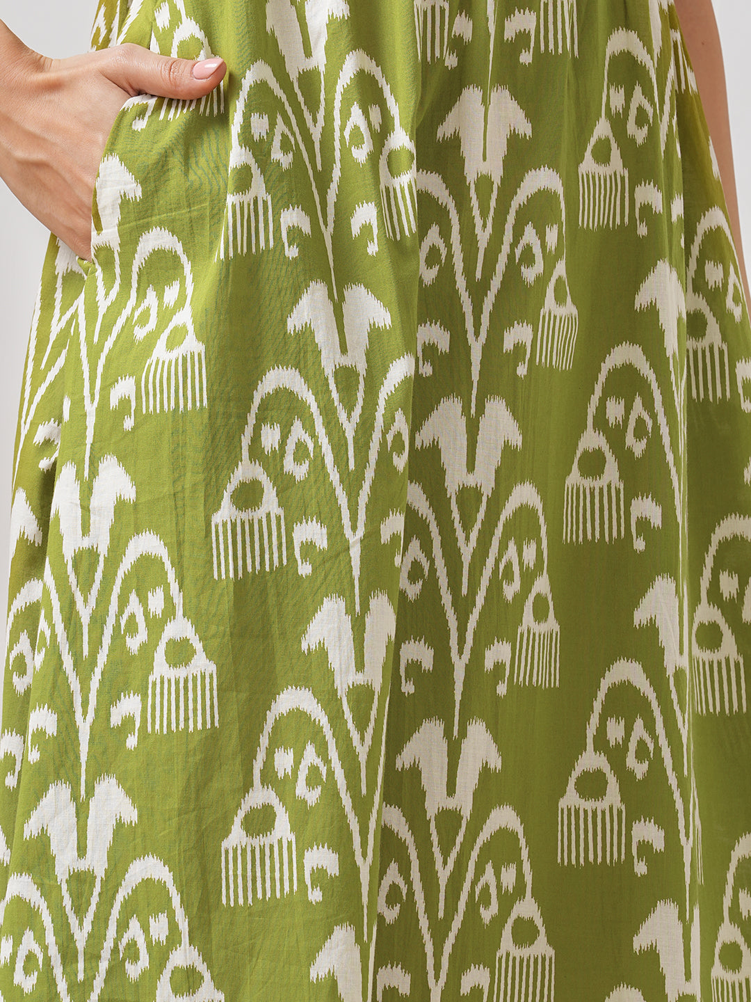 A-line dress with elasticated waist and gathered shoulders with dori and bead detail.