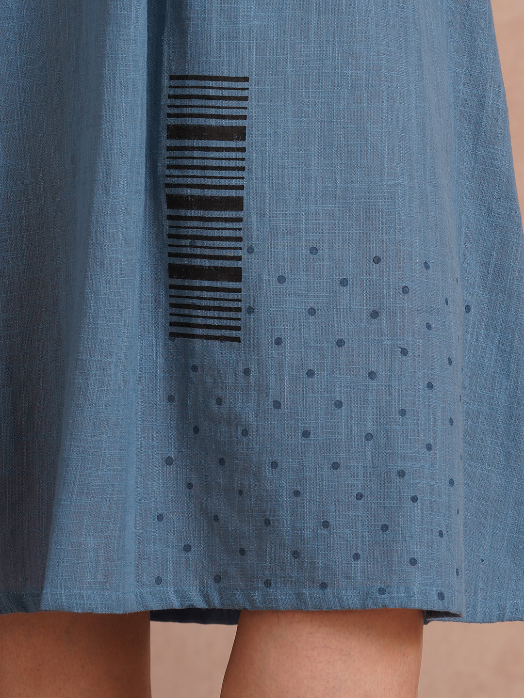 A-line placement block printed dress with centre box pleat in the front and sleeves.