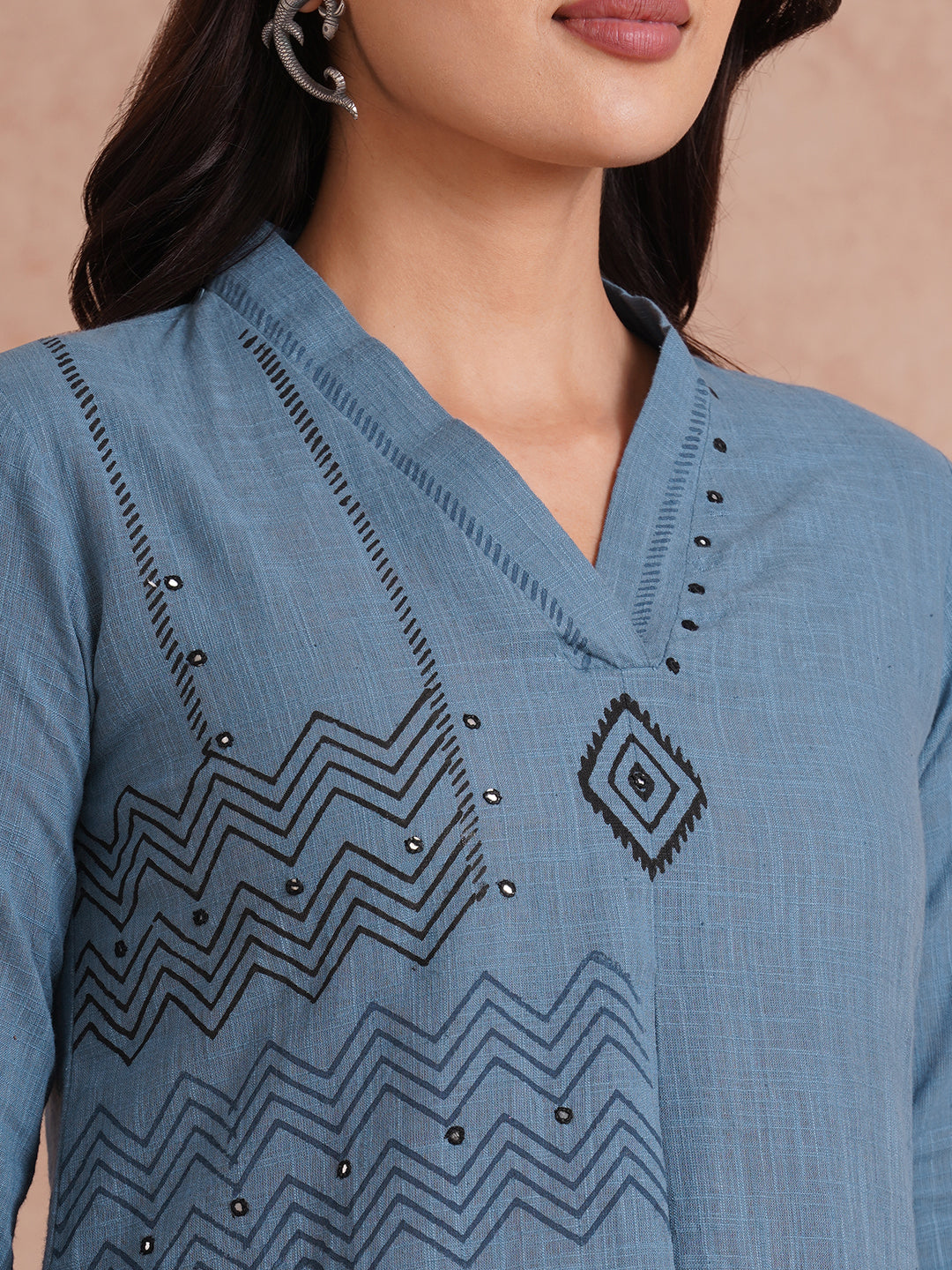 A-line placement block printed dress with centre box pleat in the front and sleeves.