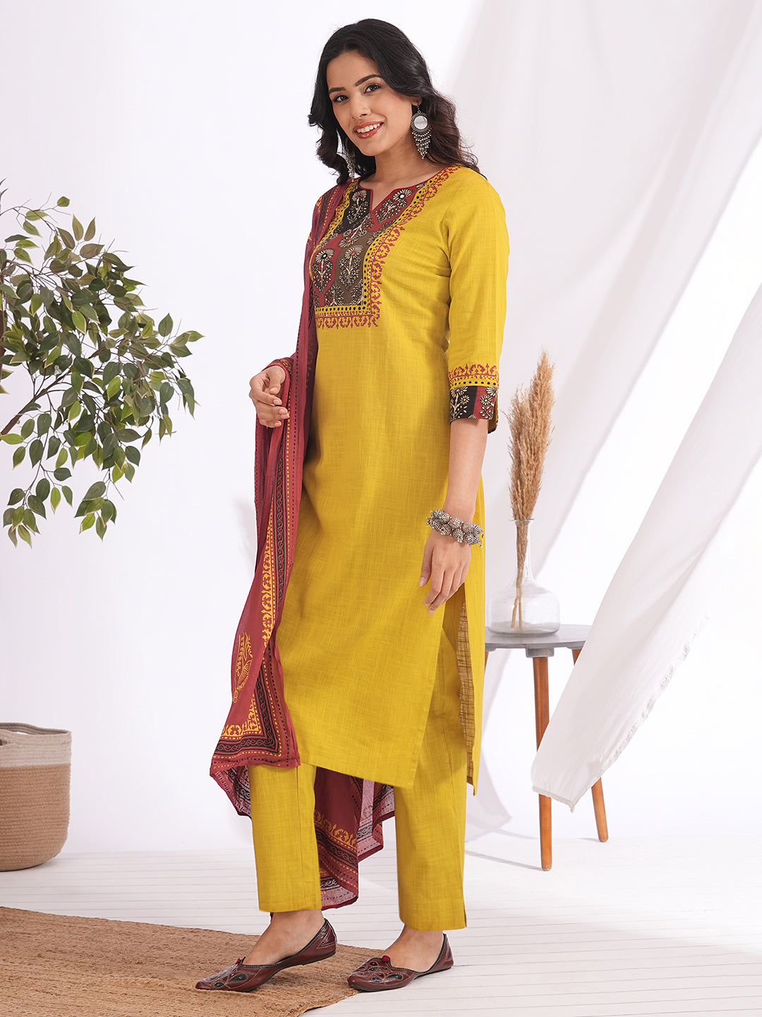 Embroidered Straight Kurta Suit Set with matching solid pants and a printed dupatta.