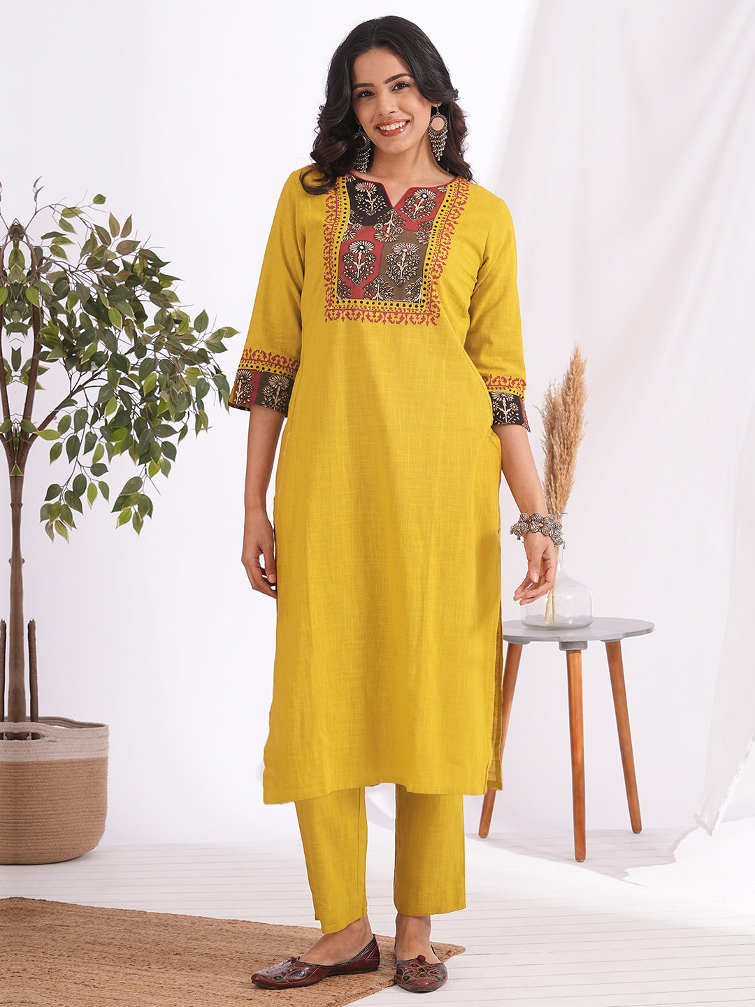 Embroidered Straight Kurta Suit Set with matching solid pants and a printed dupatta.