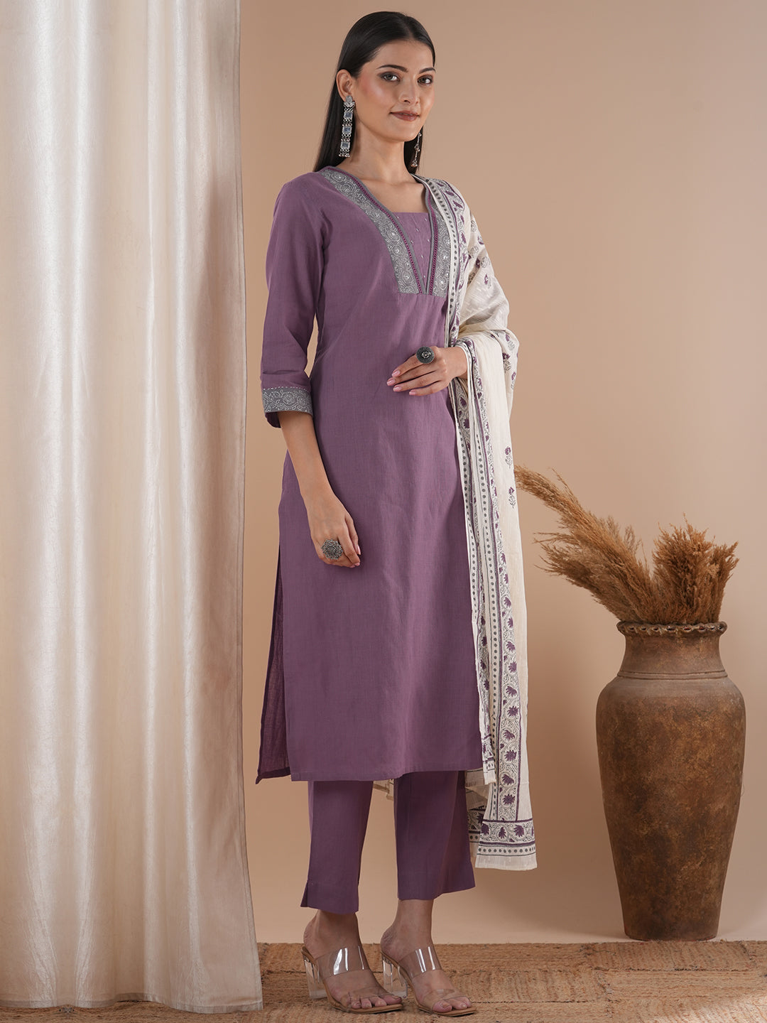 A 3-piece block printed kurta suit set with lace detail and block printed Dupatta