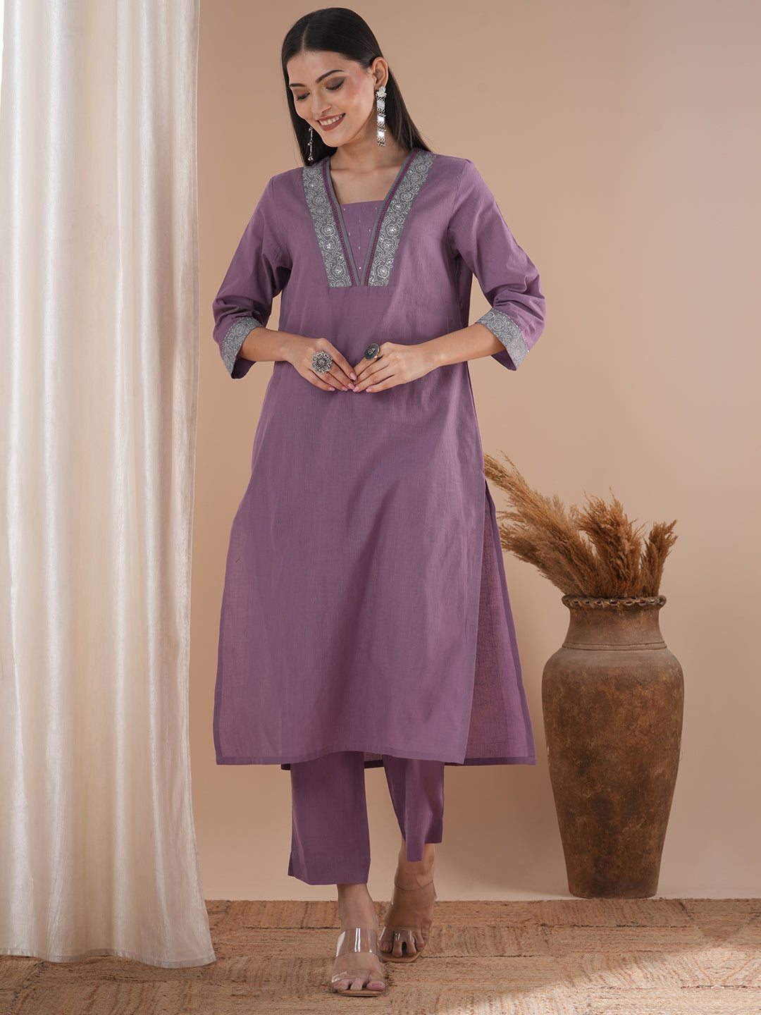 A 3-piece block printed kurta suit set with lace detail and block printed Dupatta