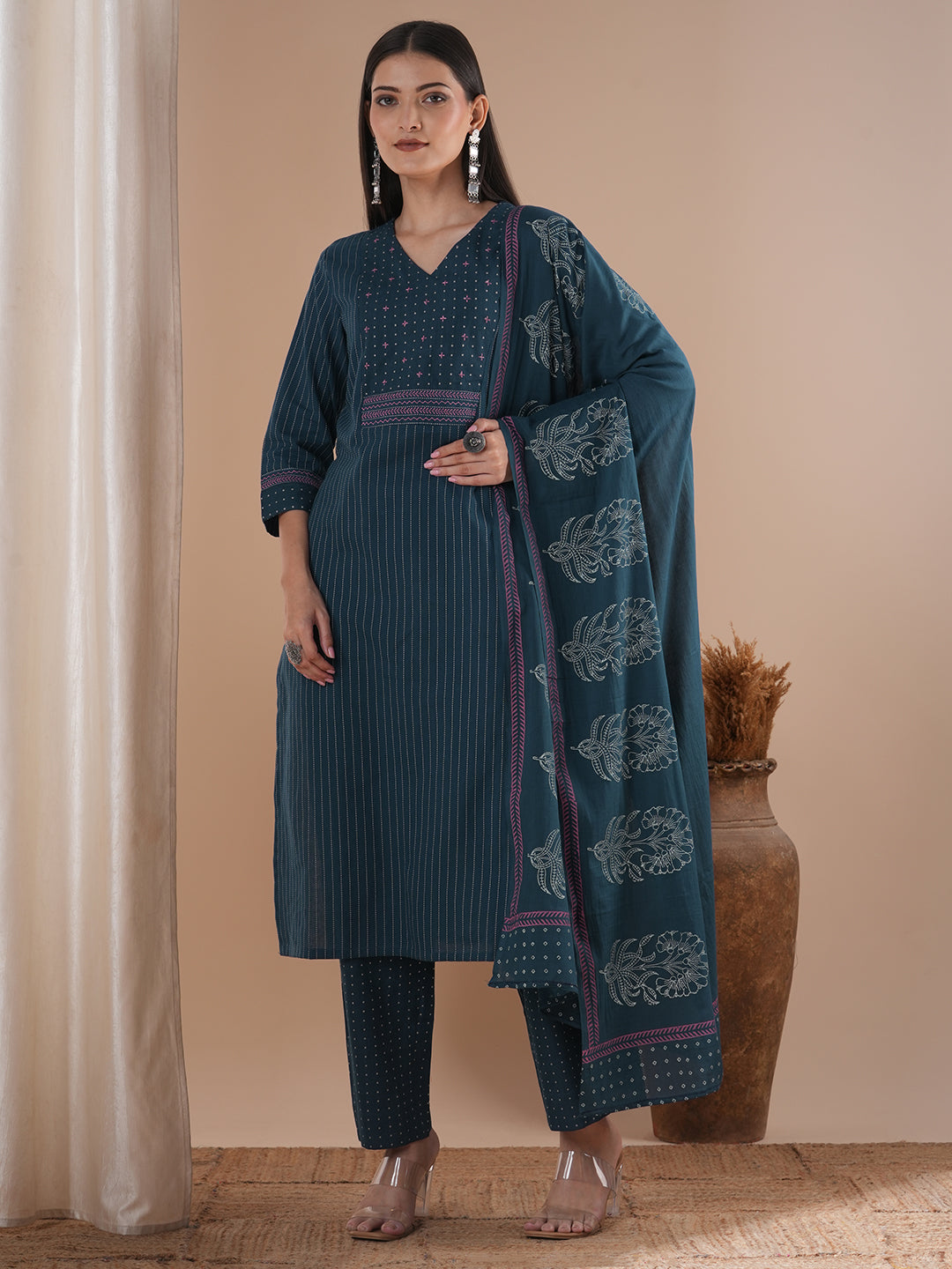 Blue dobby kurta set featuring highlights of contrasting colour embroidery & self bottom