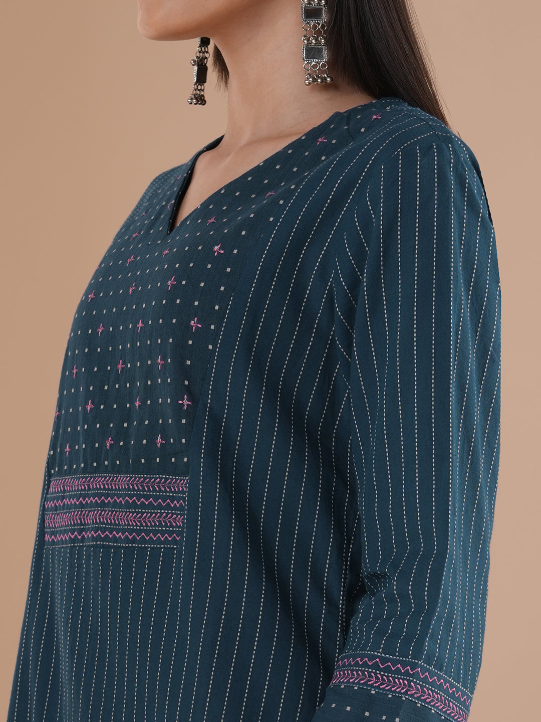 Blue dobby kurta set featuring highlights of contrasting colour embroidery & self bottom