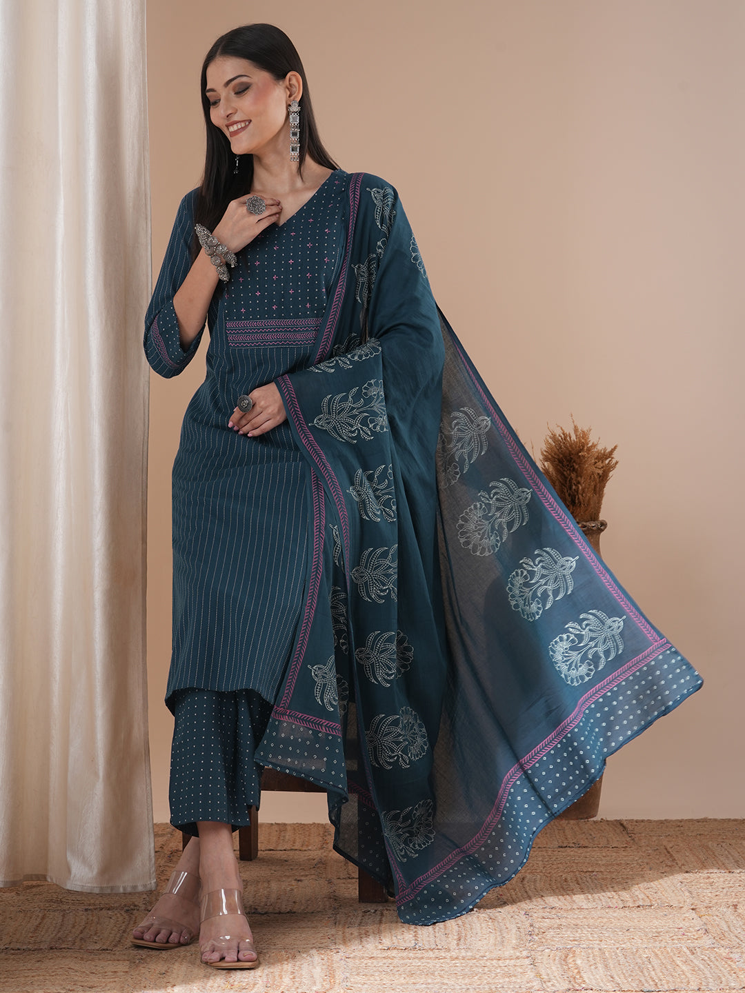 Blue dobby kurta set featuring highlights of contrasting colour embroidery & self bottom