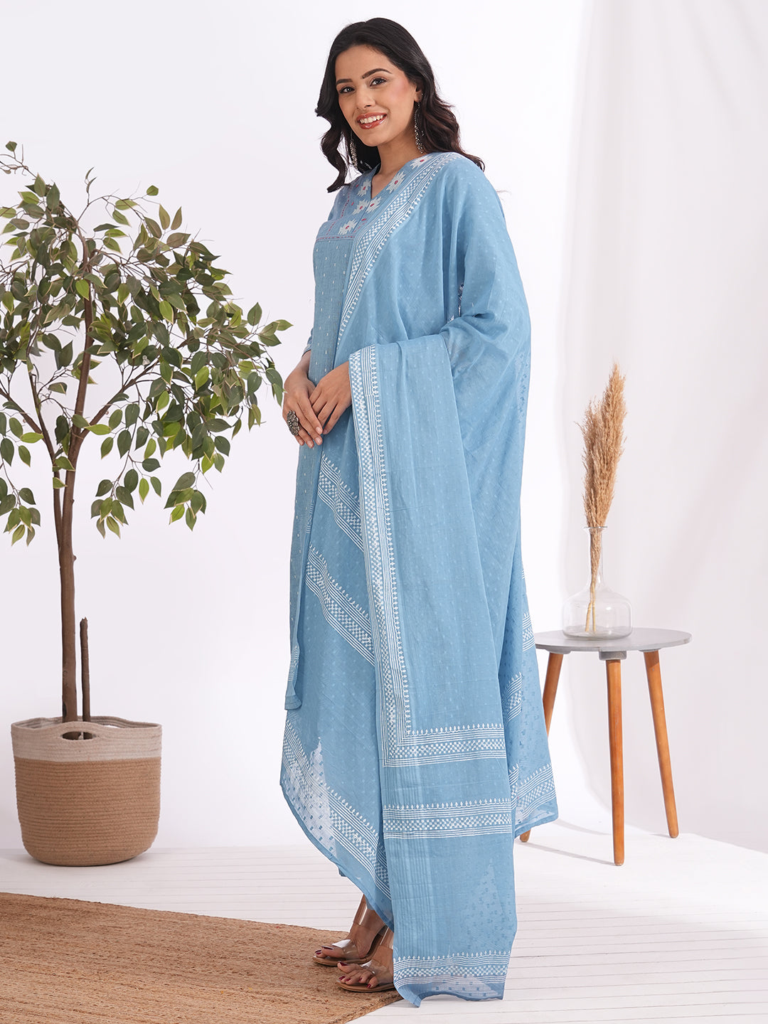 3-piece straight fit suit set mirror worked kurta adorned with a mal block printed dupatta.