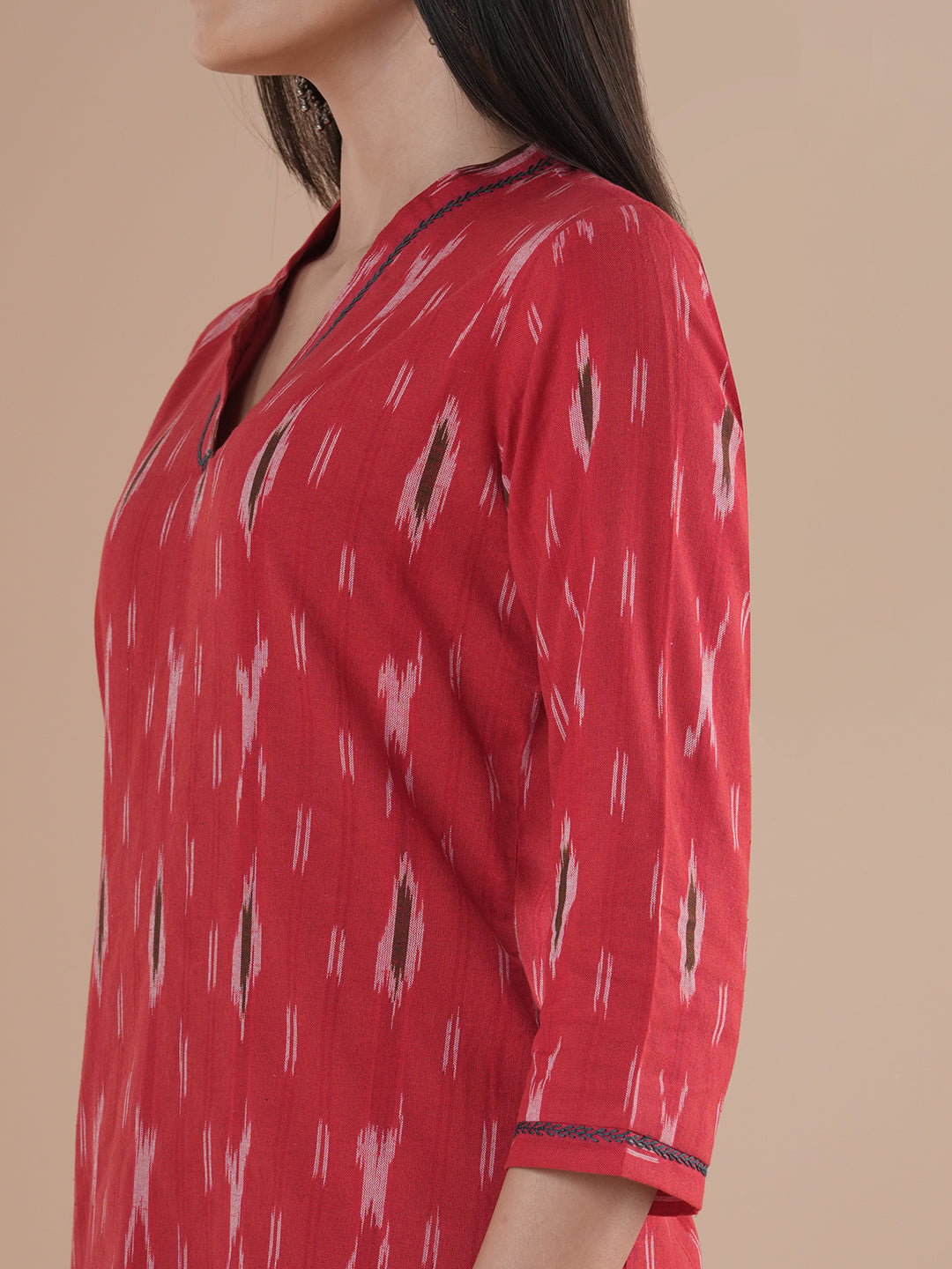 Straight fit kurta in cotton ikat fabric with hand embroidery highlight