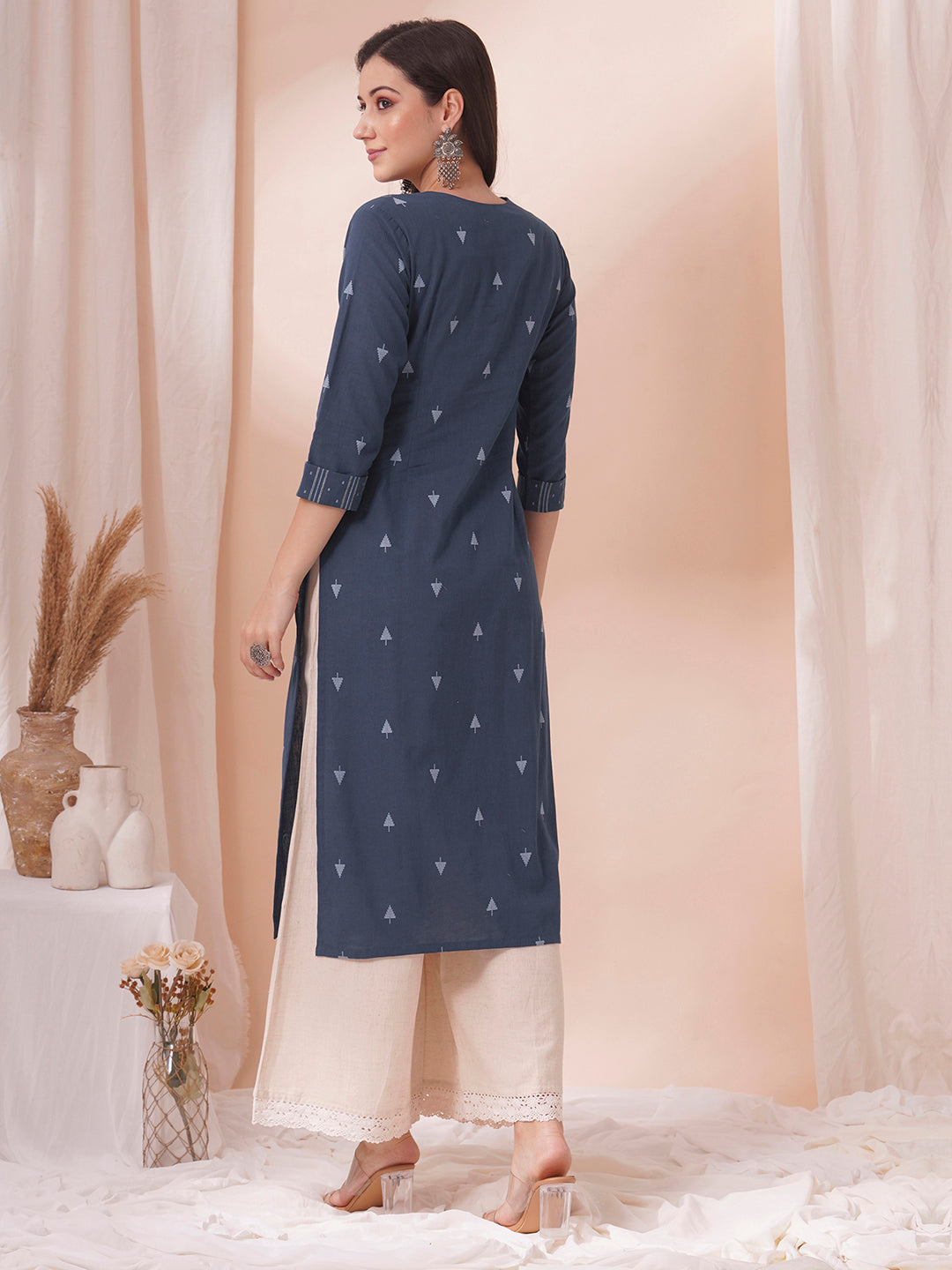 Straight fit cotton dobby kurta with hand embroidery.