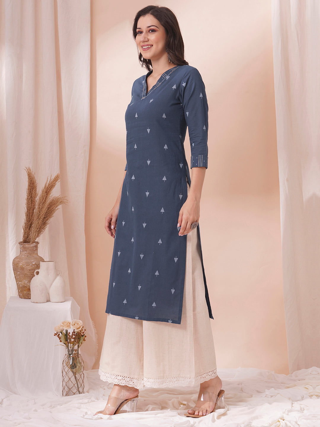 Straight fit cotton dobby kurta with hand embroidery.