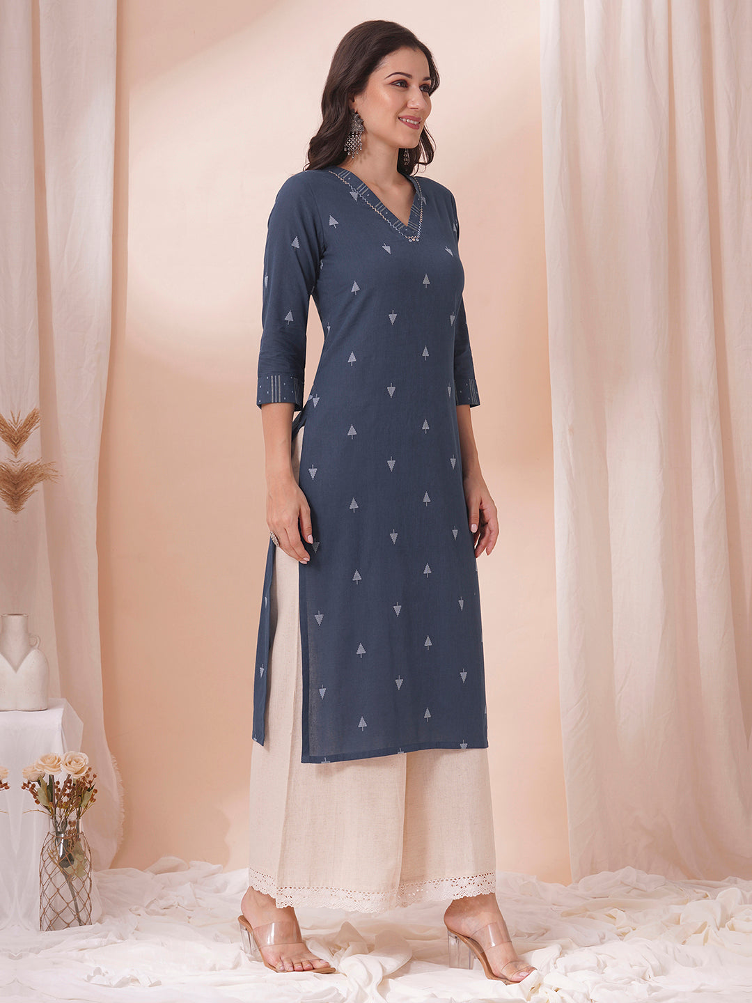 Straight fit cotton dobby kurta with hand embroidery.