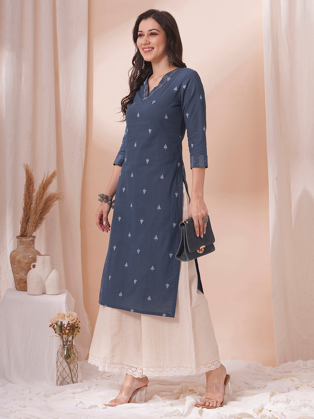 Straight fit cotton dobby kurta with hand embroidery.