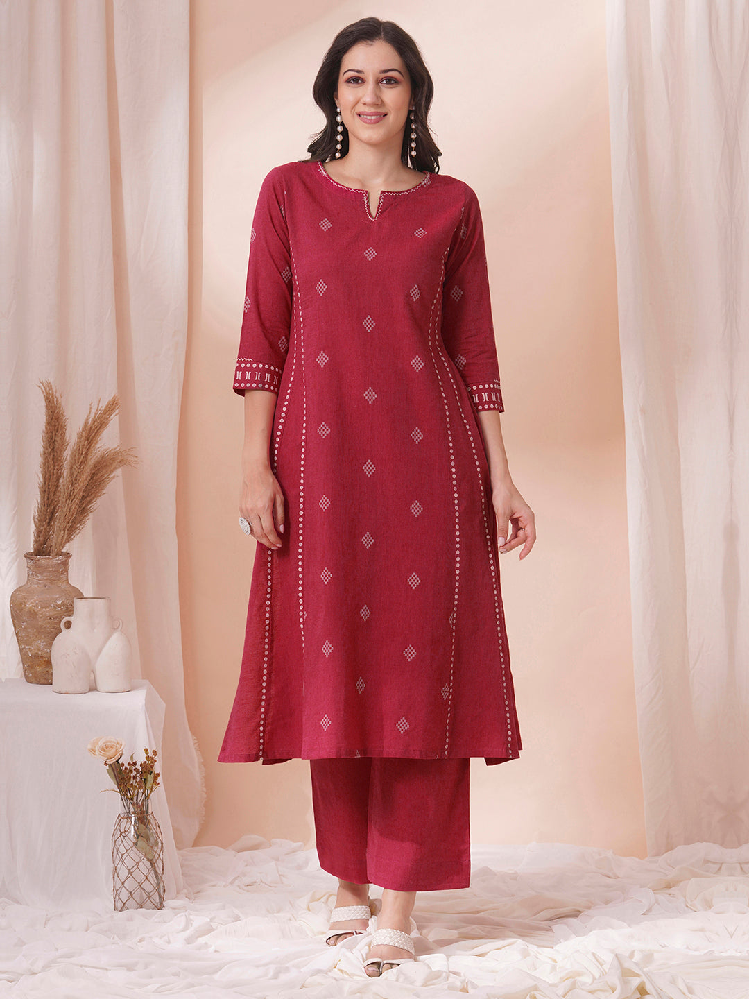 A-Line dobby kurta with block print on the princess Pannel and sleeve cuff along with handwork.