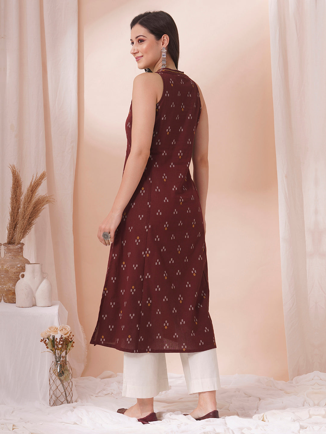 A-Line V-neck kurta in printed cotton flex with hand embroidery.