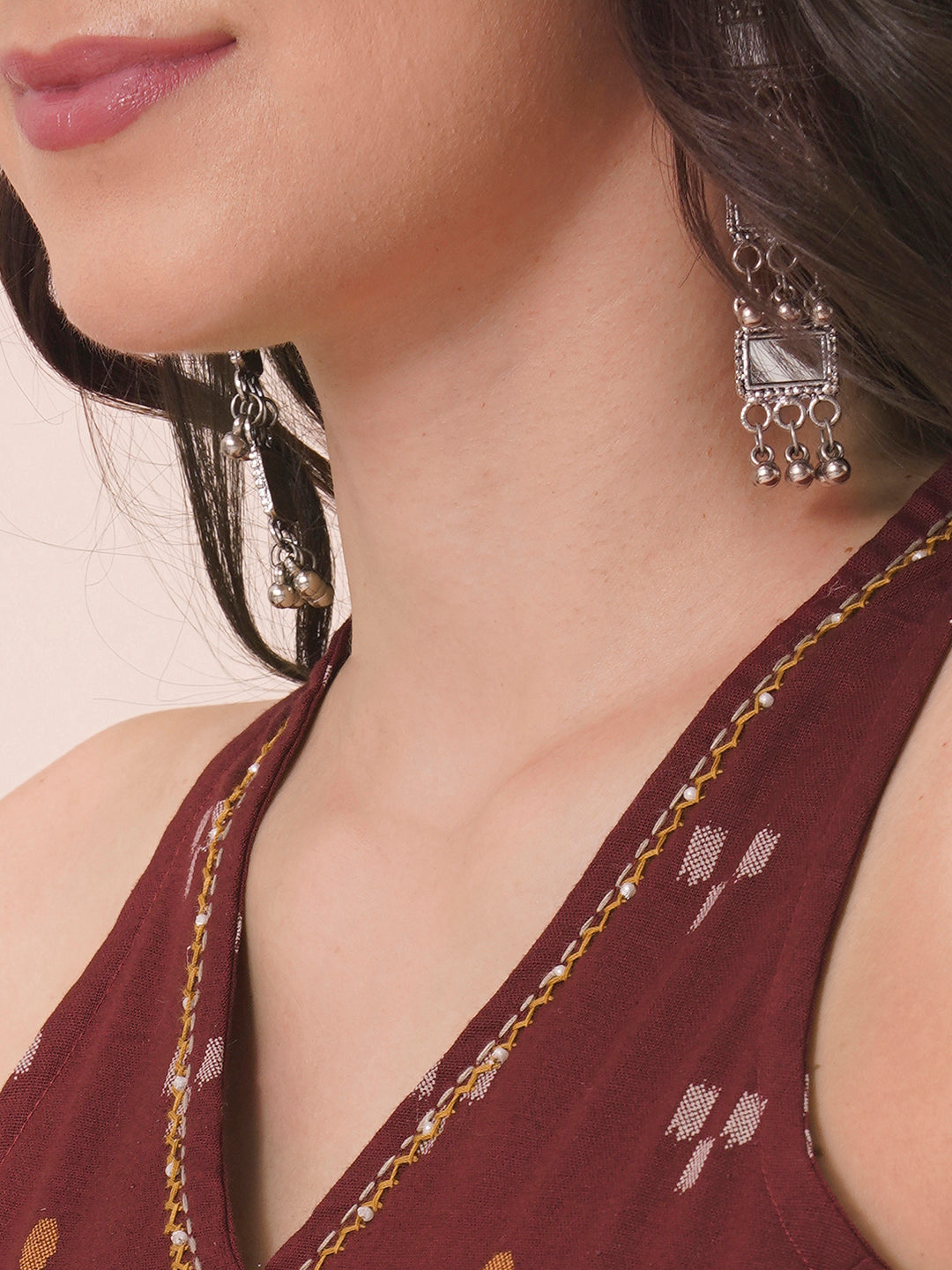 A-Line V-neck kurta in printed cotton flex with hand embroidery.