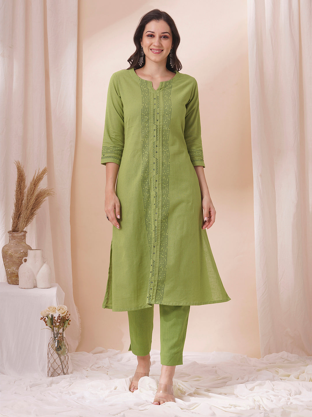 A-Line cotton flex kurta in summery green with hand block print and mirror work.