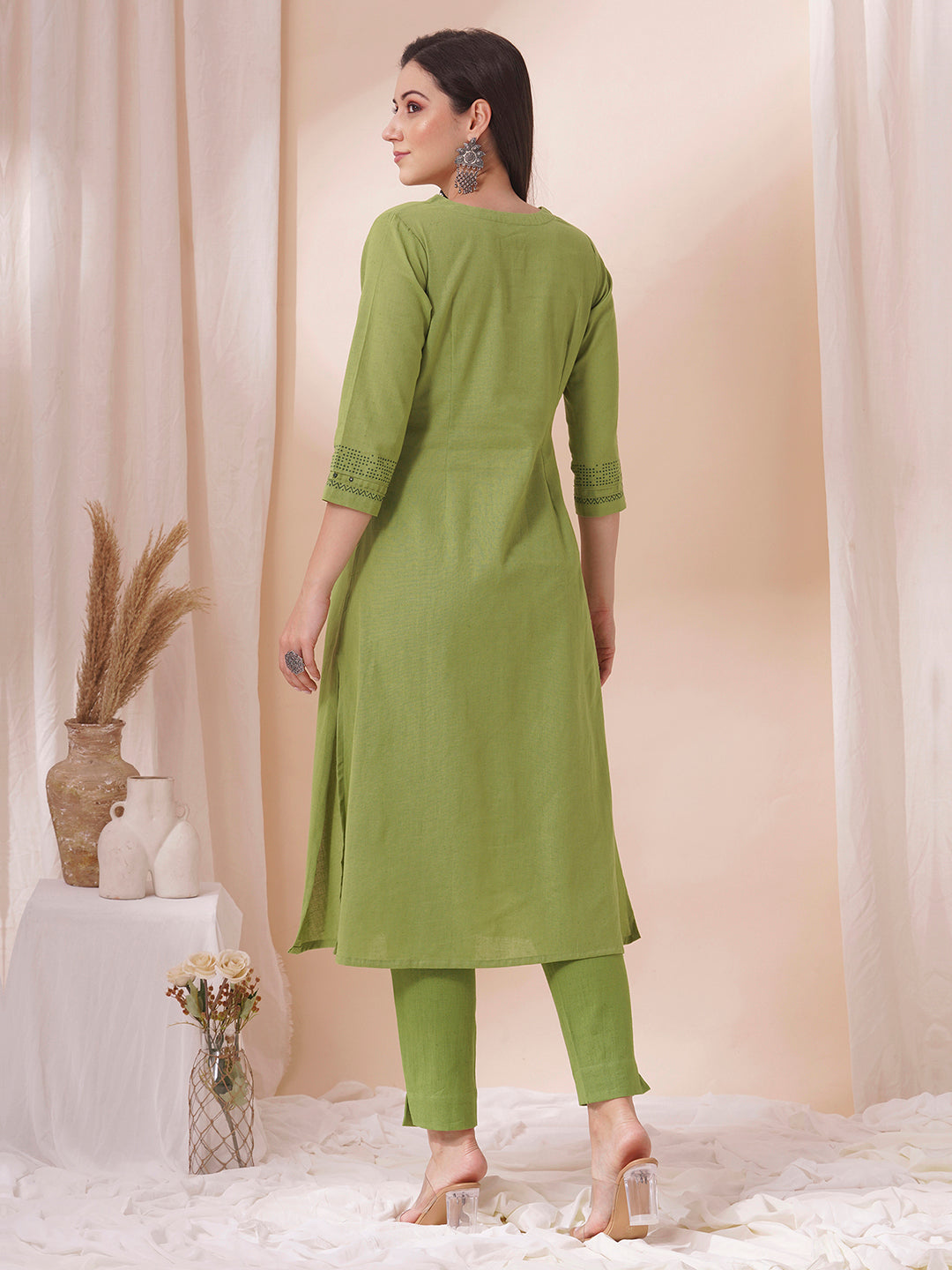 A-Line cotton flex kurta in summery green with hand block print and mirror work.