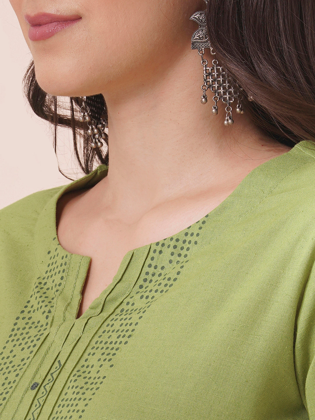 A-Line cotton flex kurta in summery green with hand block print and mirror work.