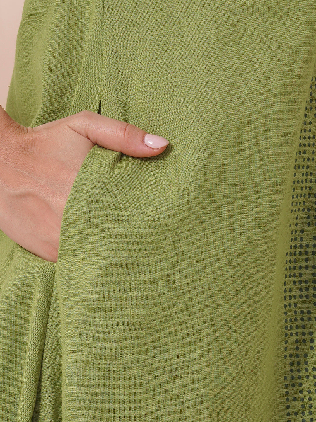 A-Line cotton flex kurta in summery green with hand block print and mirror work.