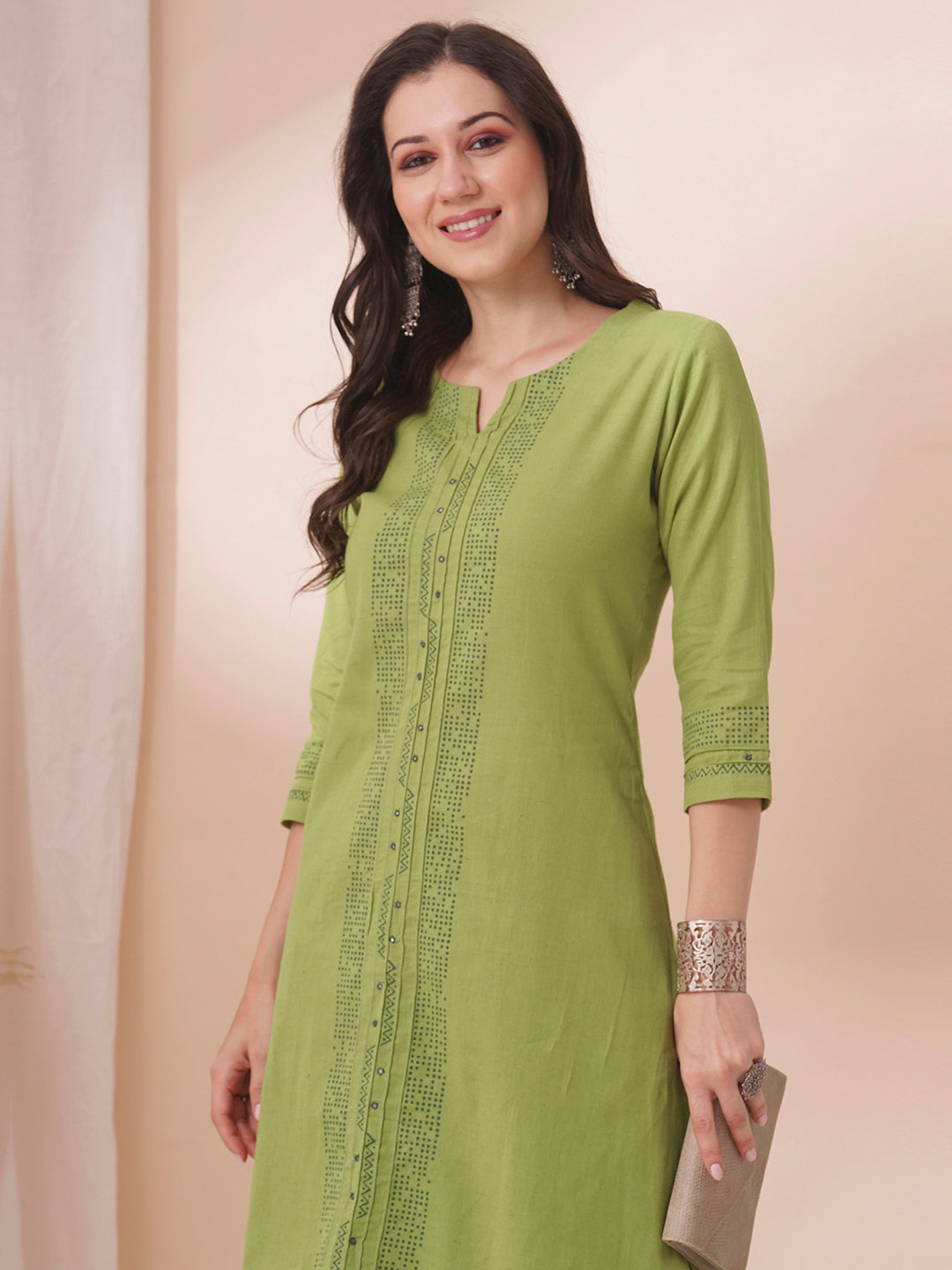 A-Line cotton flex kurta in summery green with hand block print and mirror work.