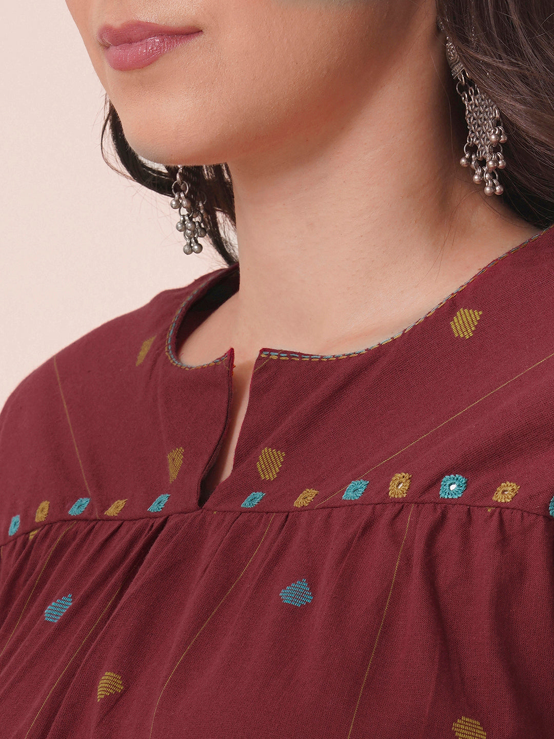 Pocketed cotton dobby kurta with gathering and mirror work.