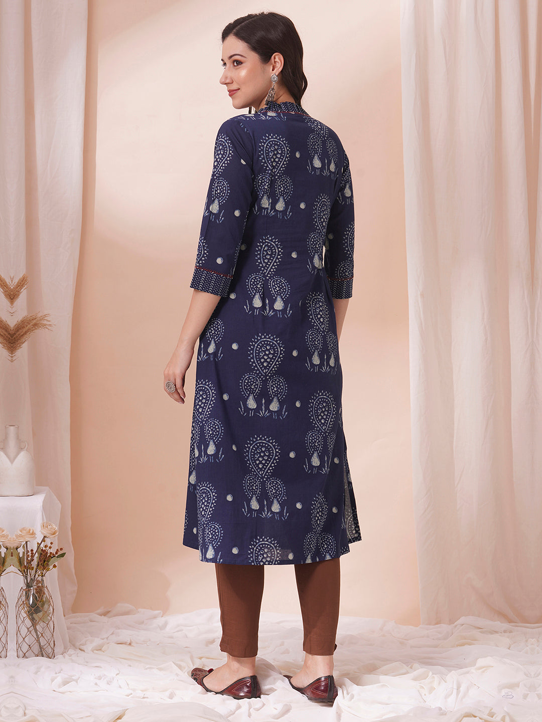 A-line kurta in printed cotton with gathered stripe print on the neckline with handwork.