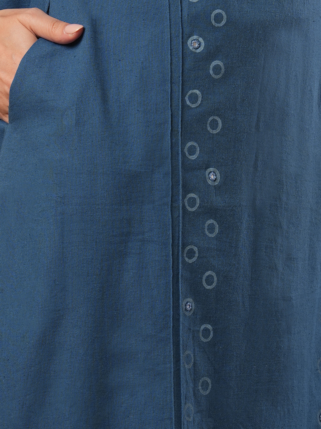 A-line cotton flex kurta with mirror work and attached thread tassels.