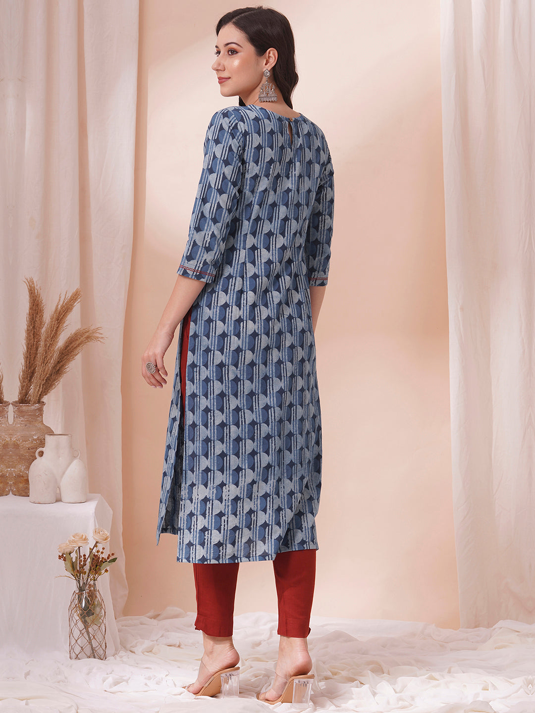 Straight fit dhabu print kurta with embroidery and pleating.