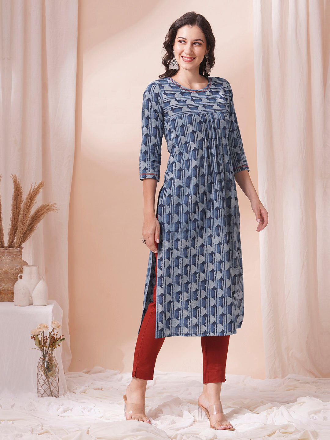 Straight fit dhabu print kurta with embroidery and pleating.
