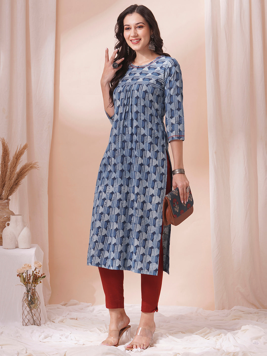 Straight fit dhabu print kurta with embroidery and pleating.