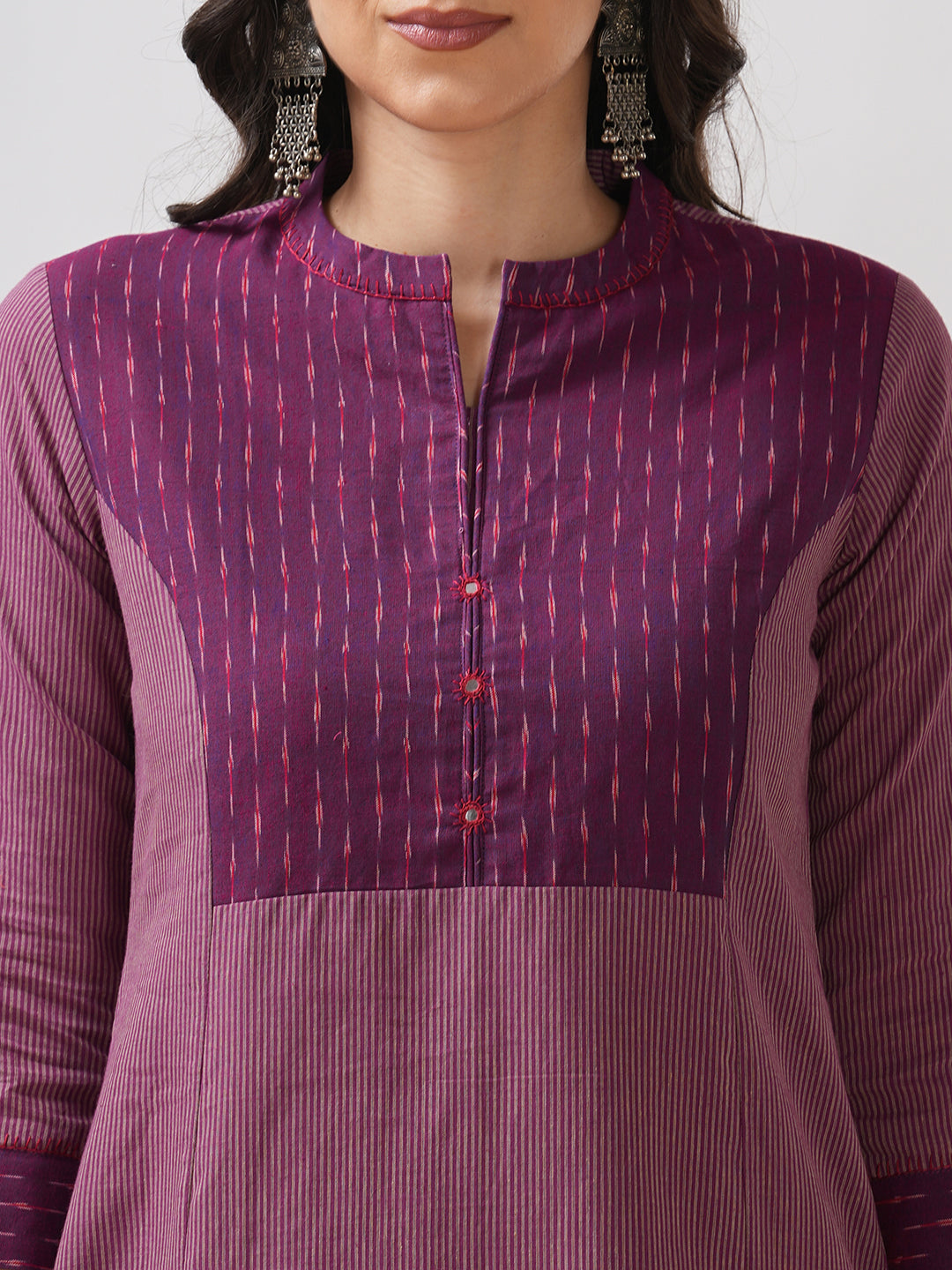 Striped cotton kurta in an A line fit with an ikkat trim and hand embroidery.