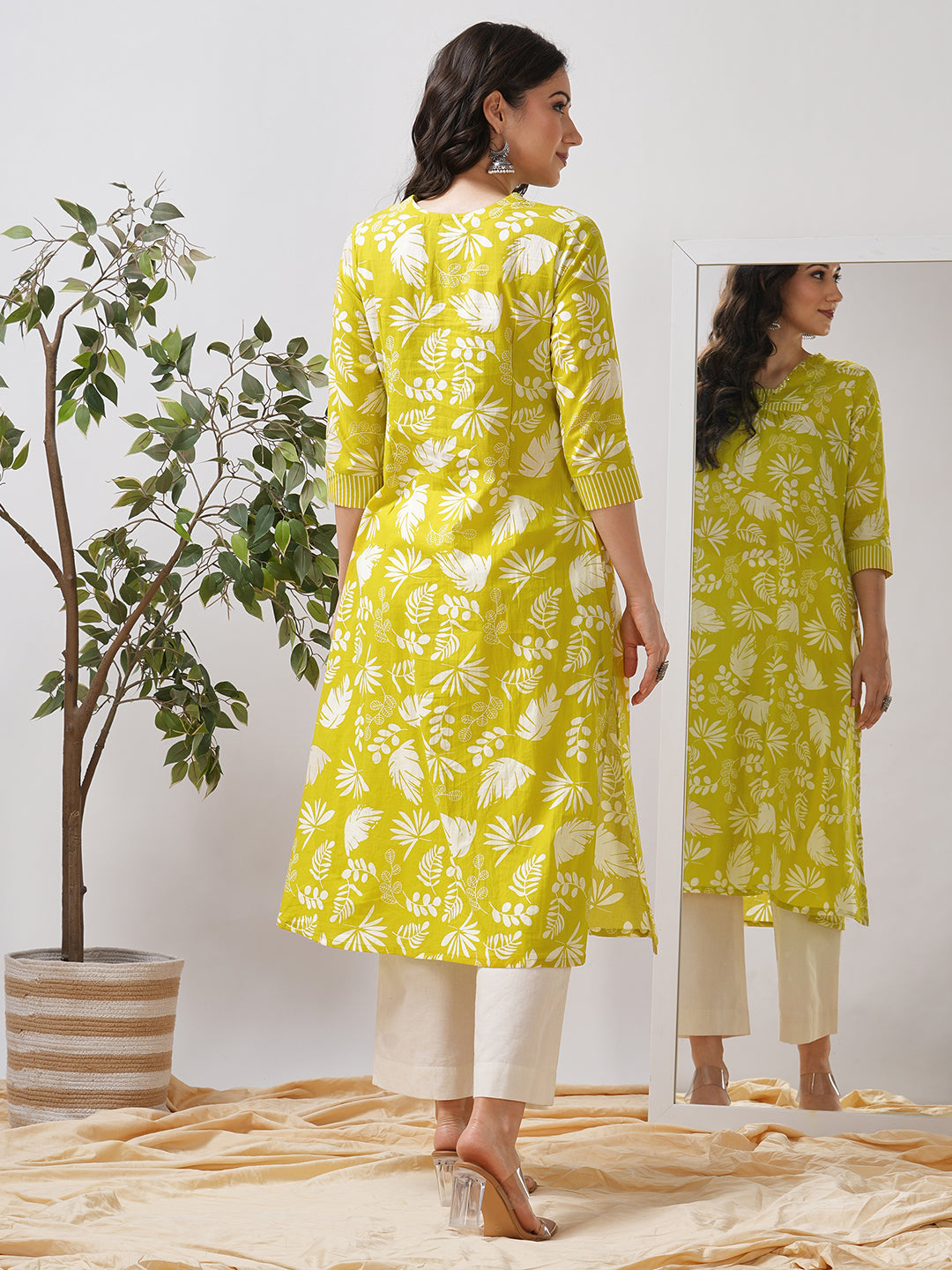 Gathered A line kurta in printed cotton fabric with hand embroidery and pocket.