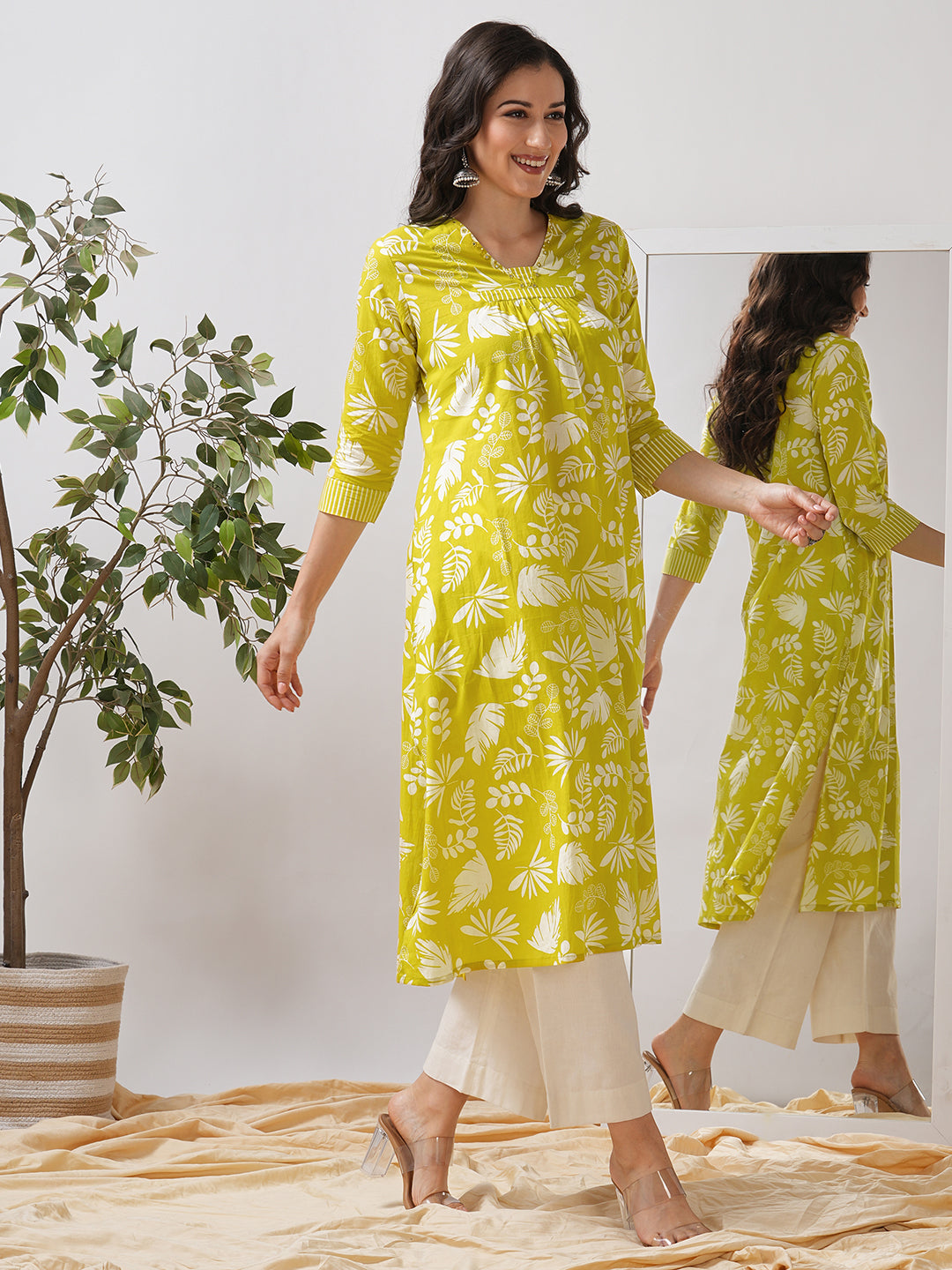 Gathered A line kurta in printed cotton fabric with hand embroidery and pocket.