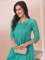 Blue Pleated cotton print kurta in an A-Line fit with hand embroidery and pocket.
