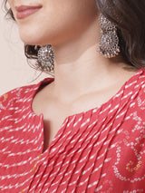 Red Pleated cotton print kurta in an A-Line fit with hand embroidery and pocket.