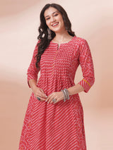 Red Pleated cotton print kurta in an A-Line fit with hand embroidery and pocket.