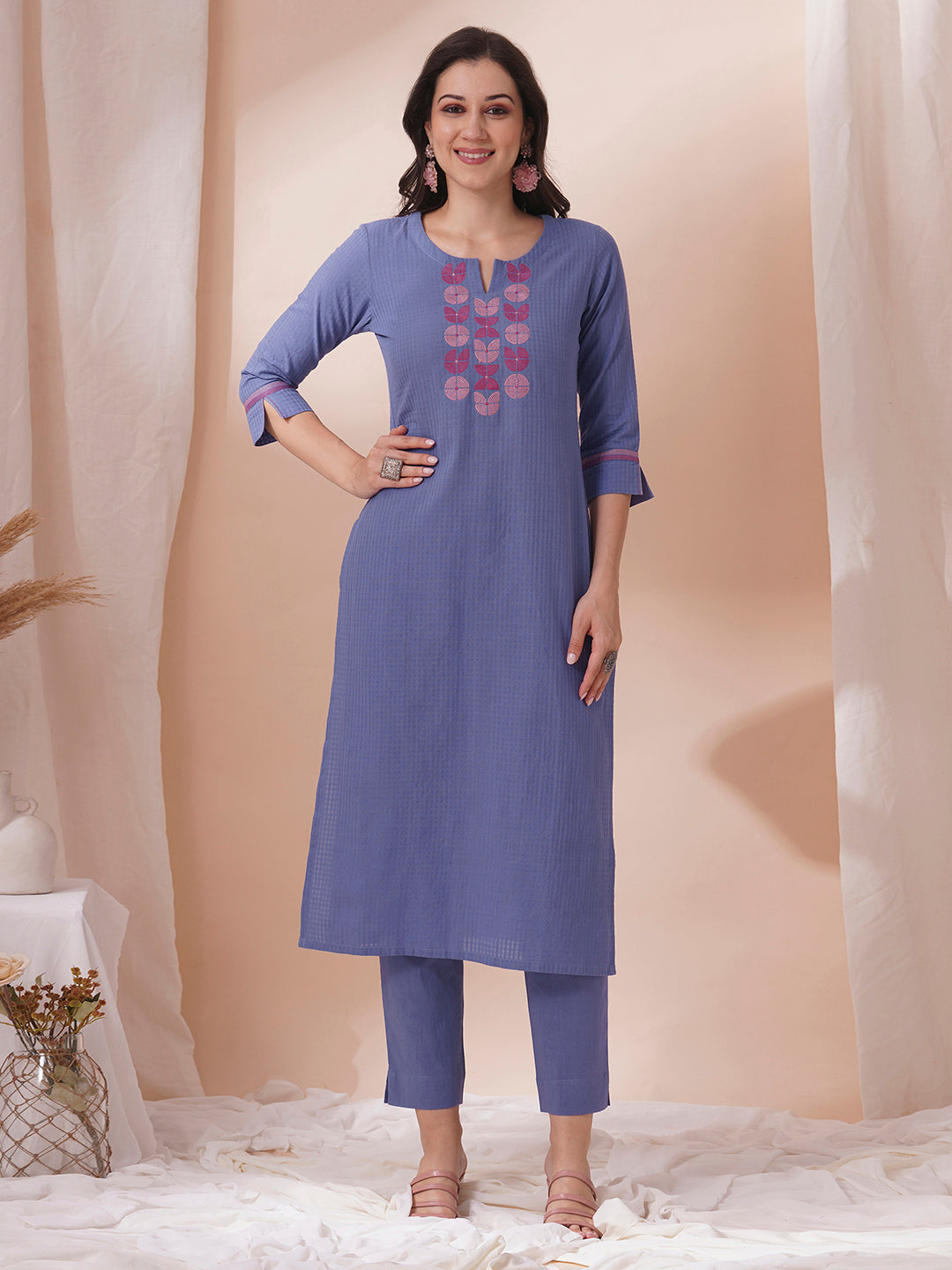 Embroidered straight fit kurta in checkered cotton fabric.