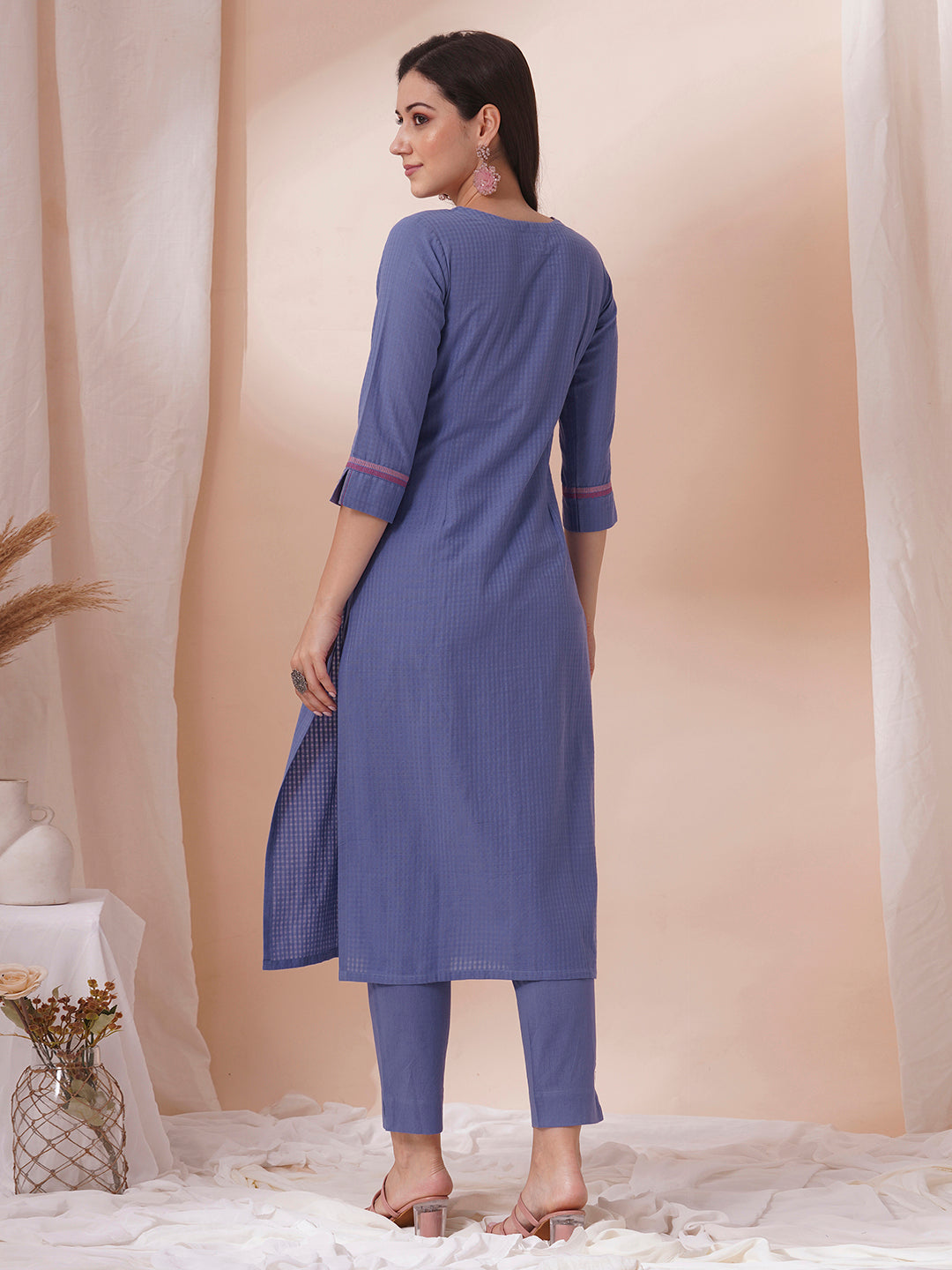 Embroidered straight fit kurta in checkered cotton fabric.