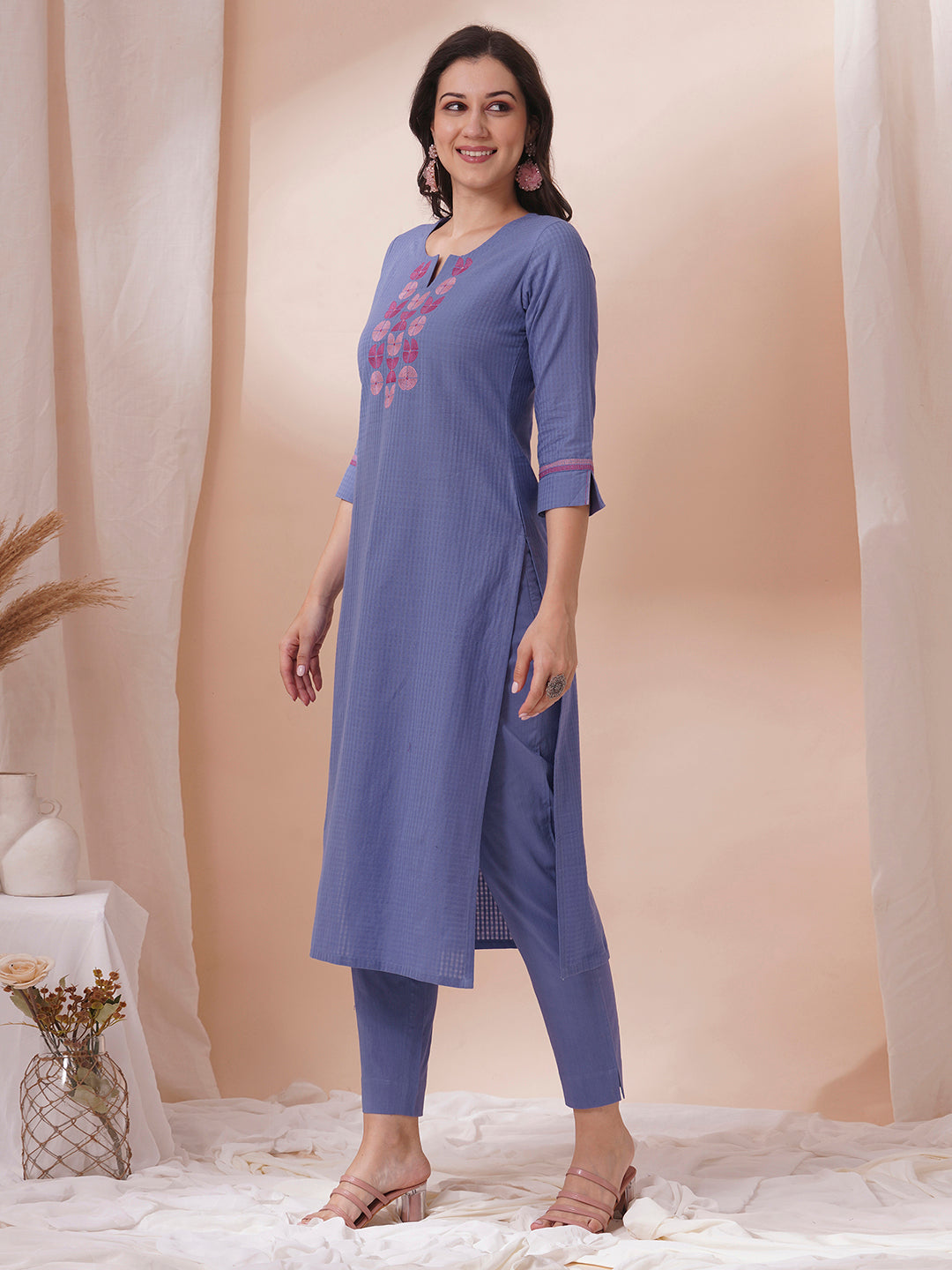 Embroidered straight fit kurta in checkered cotton fabric.