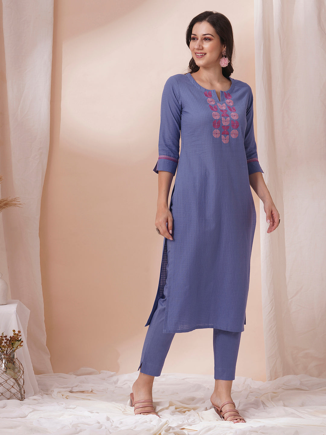 Embroidered straight fit kurta in checkered cotton fabric.