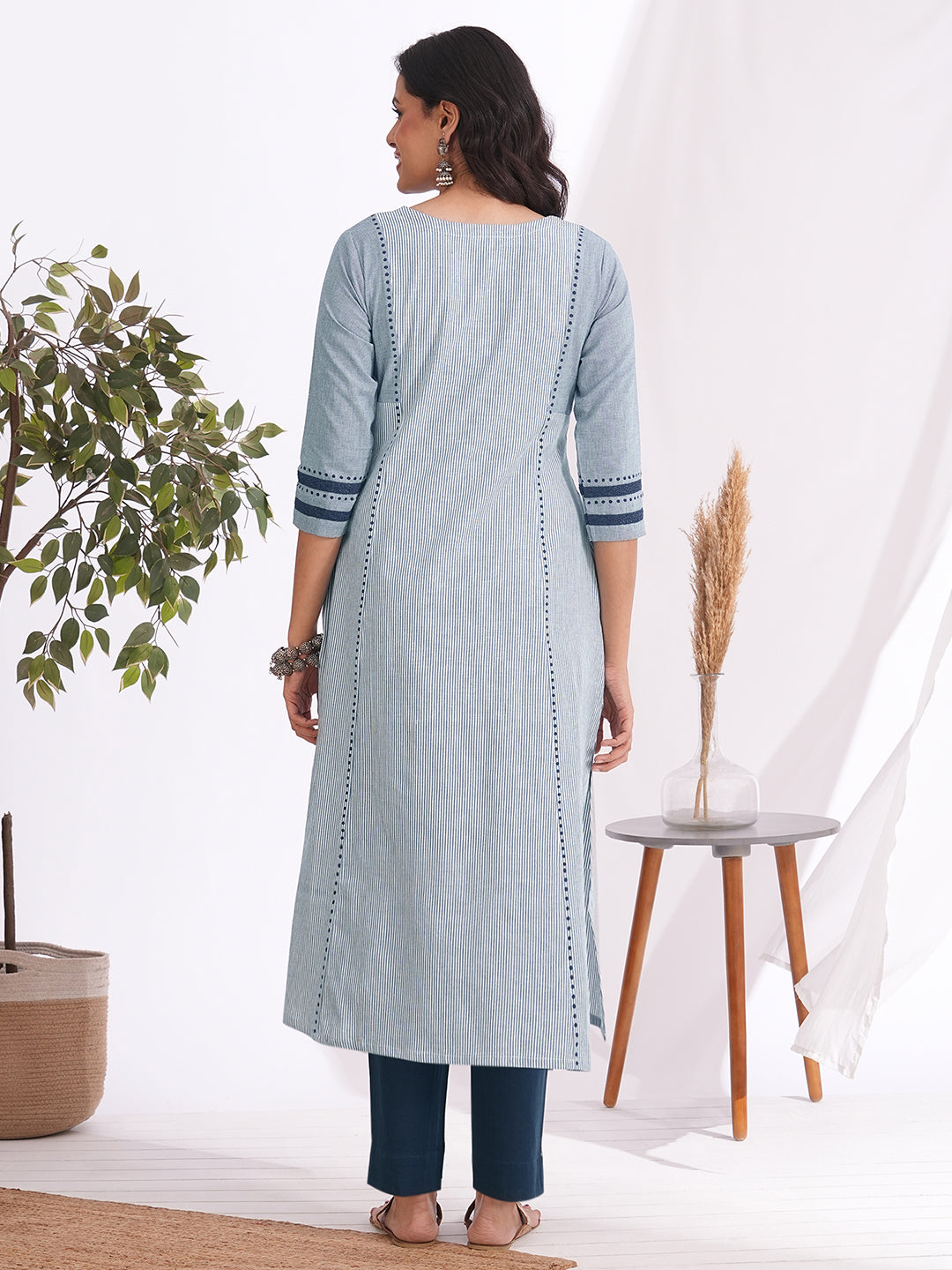 Pocketed A-line kurta in woven cotton fabric with block print and hand embroidery