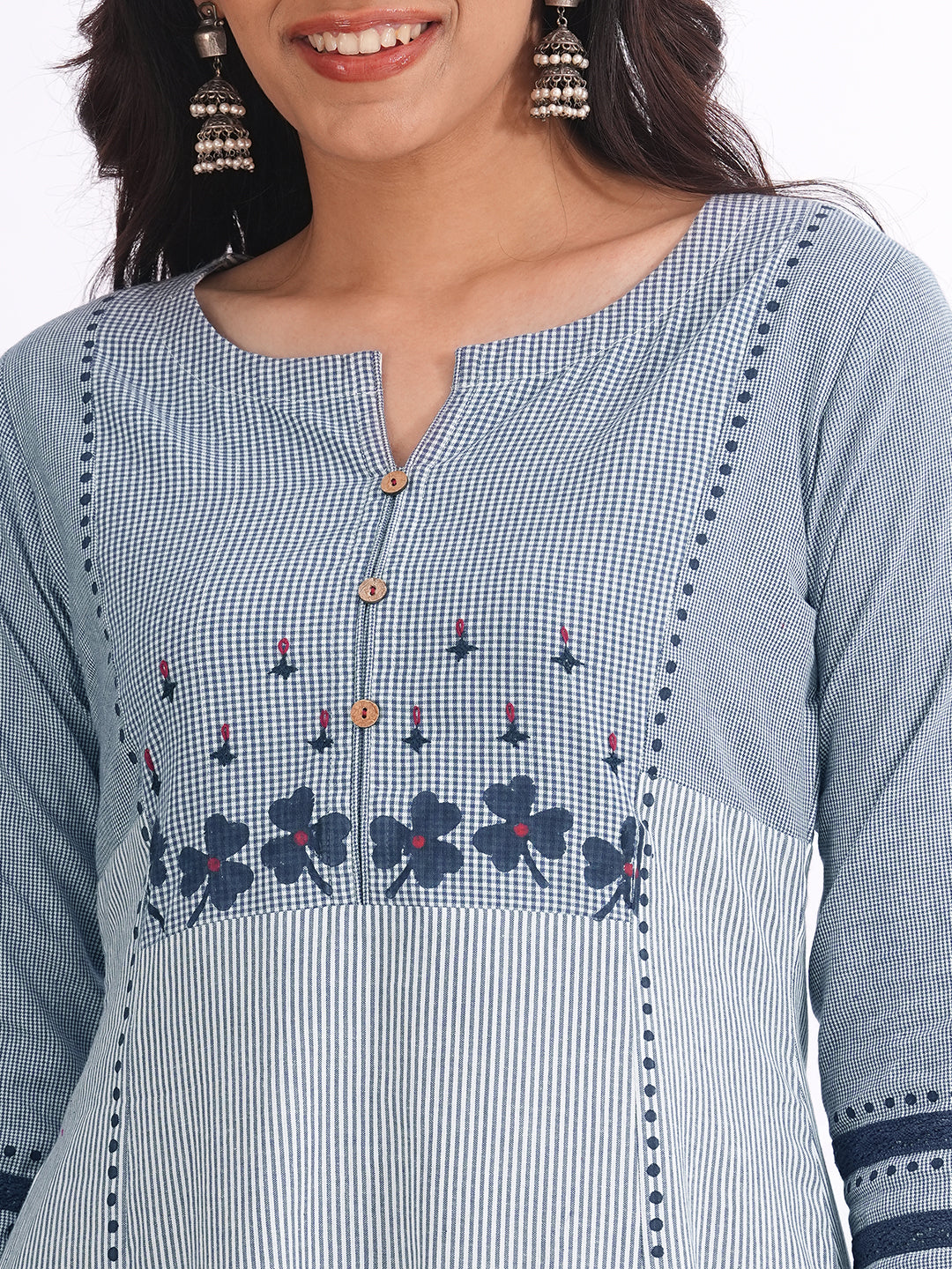 Pocketed A-line kurta in woven cotton fabric with block print and hand embroidery