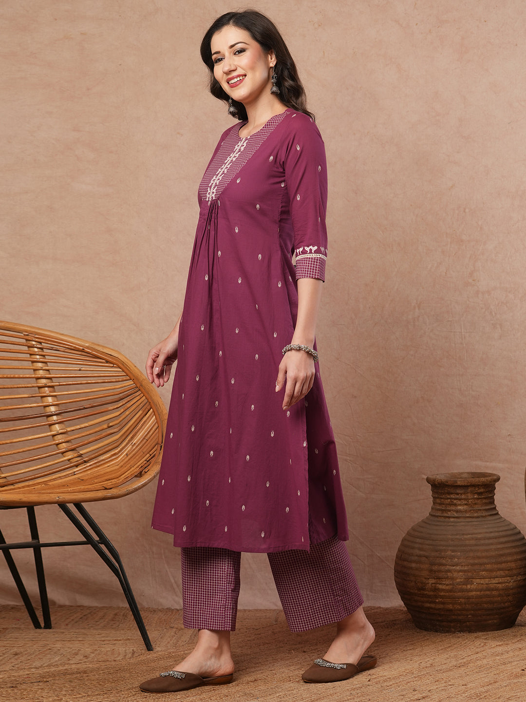 Pleated A-line printed cotton kurta with lace, block print, handwork and pocket.