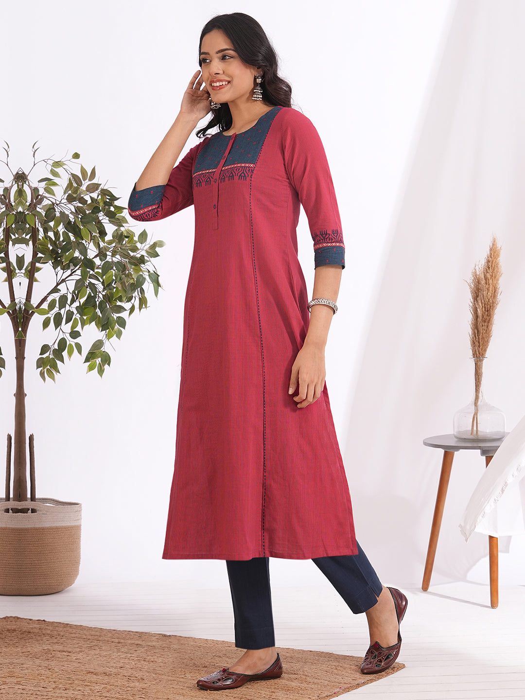 Pocketed A-line kurta in woven stripe cotton with a dobby trim, block print and handwork detailing
